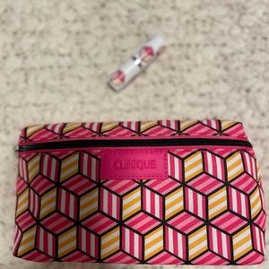 New Clinique women’s pink cosmetics bag & lipstick